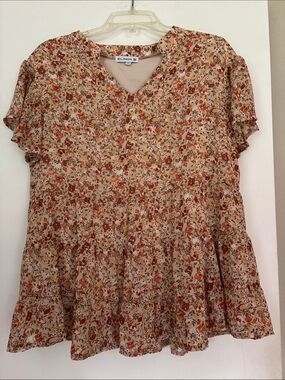 Elings Floral V-Neck Peplum Blouse in Beige and Orange